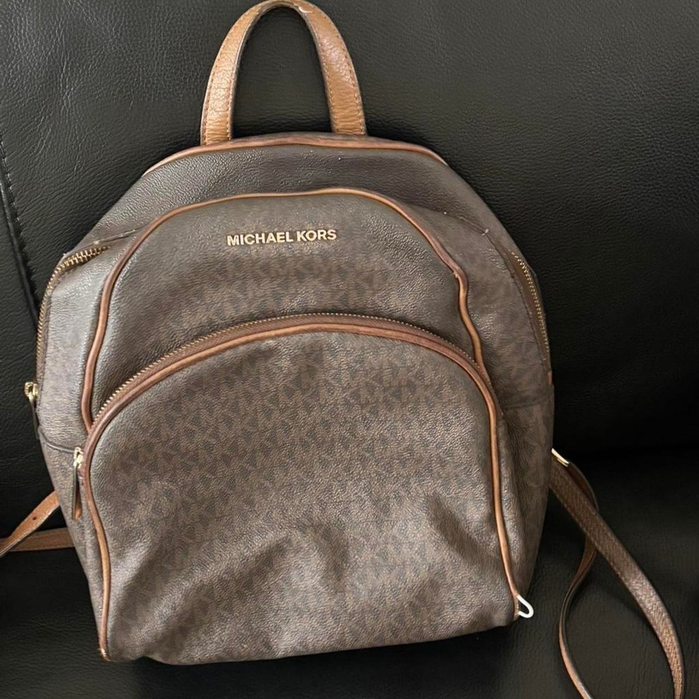 Michael‎ Kors brown monogram backpack purse with gold hardware